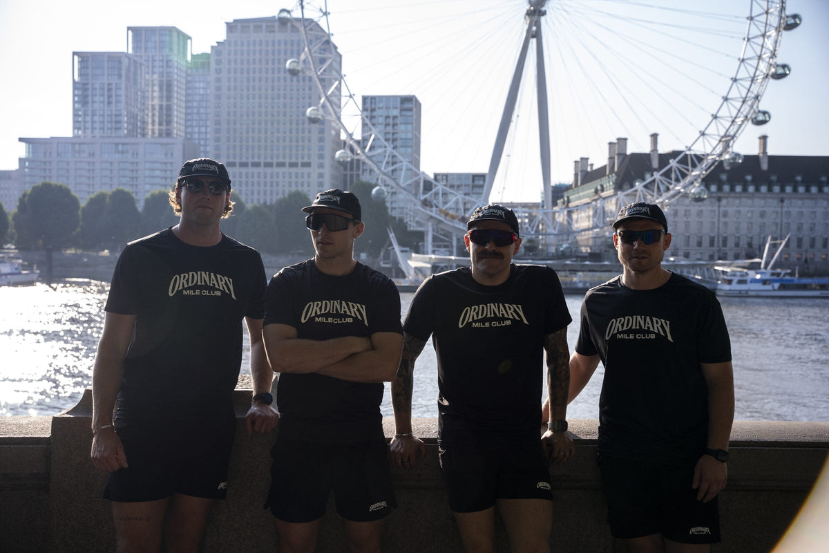 Ordinary Mile Club runners on a long training run beside the River Thames in London, preparing for a half marathon
