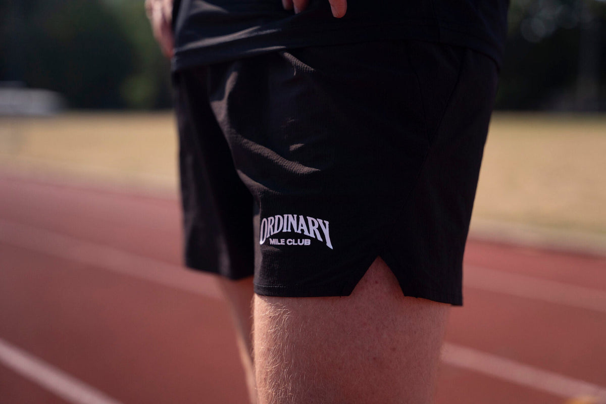 Runner in Ordinary Mile Club kit after a run in Aberdeenshire