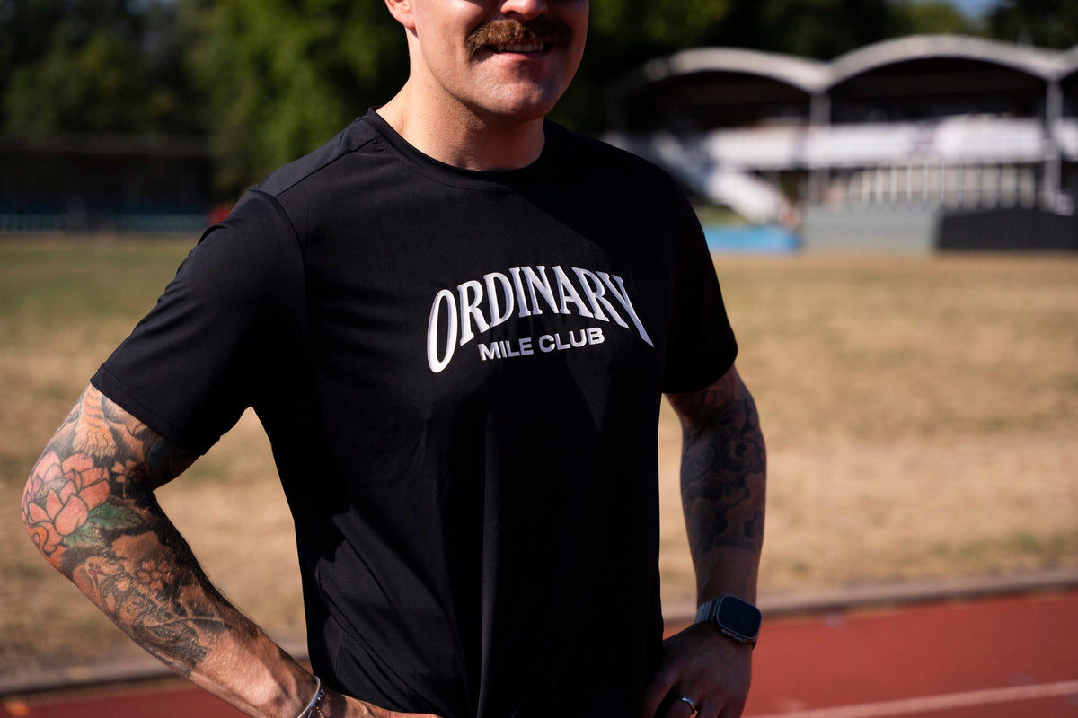 Runner in Ordinary Mile Club kit after a run in Ayrshire
